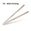 A pair of light wood drumsticks with printing on the shaft.