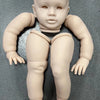 A realistic reborn baby doll kit of a nude infant with smooth skin and unpainted features.