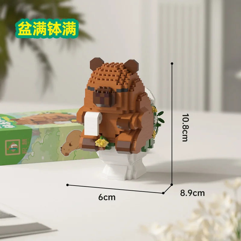 An orange Capybara micro building block figure standing on a white base.