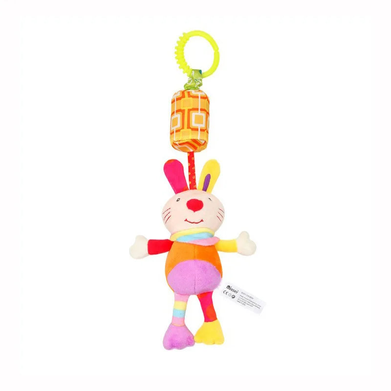 A plush rabbit hanging rattle toy with a yellow ring and orange body.