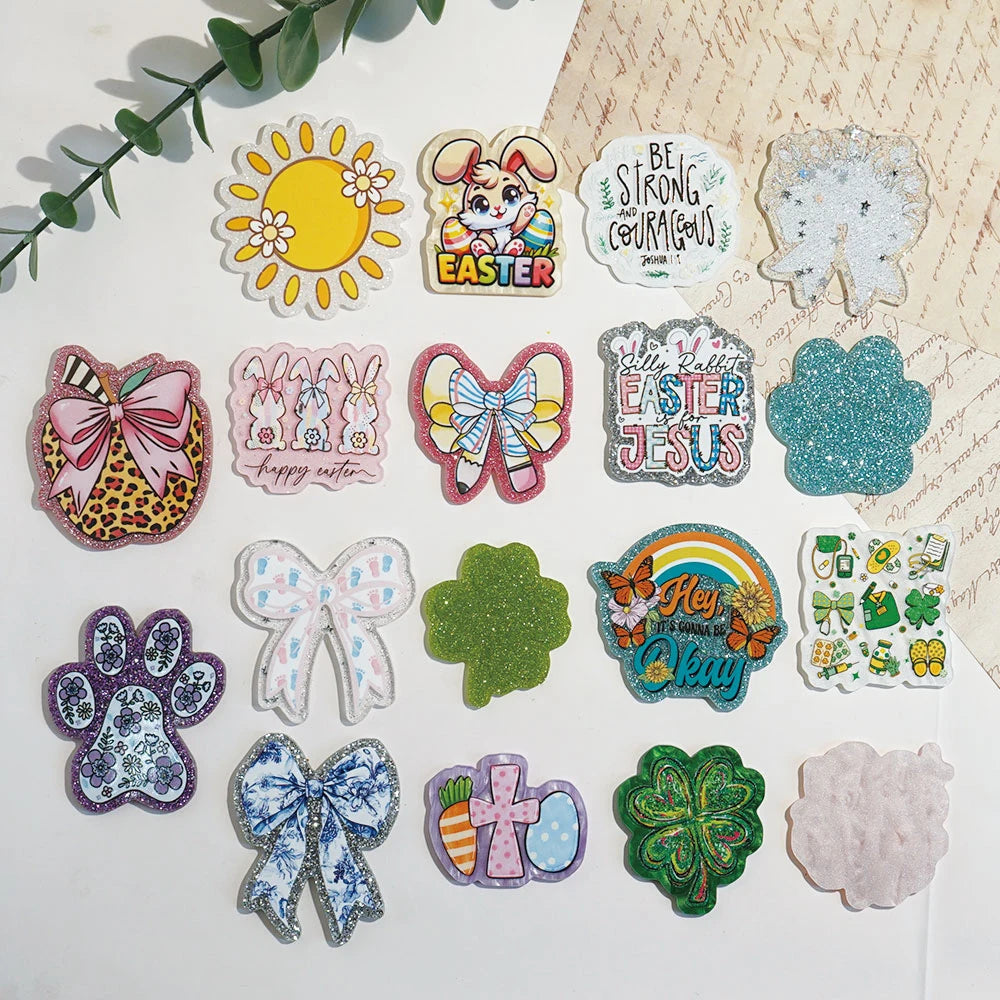 A collection of 10 glitter acrylic flatback resin cabochons featuring Easter and floral themes for DIY crafts.