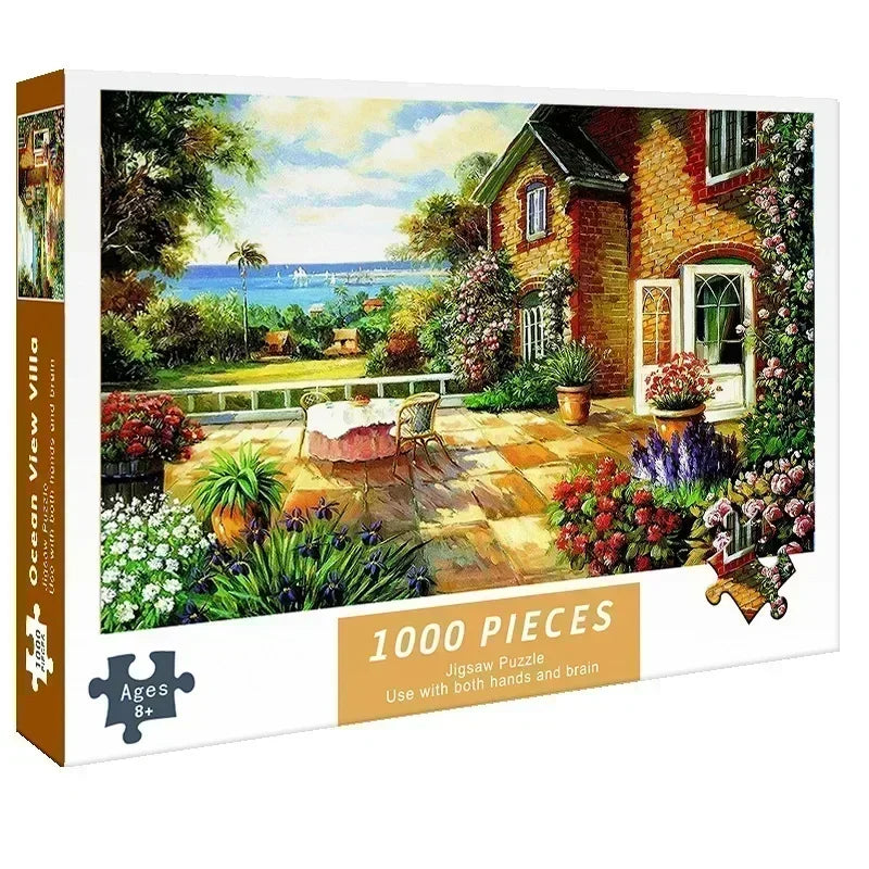 A 1000-piece jigsaw puzzle depicting a picturesque garden scene with a house and ocean view.