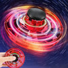 A red magic LED flying orb boomerang ball with glowing lights spinning against a dark blue cosmic background.