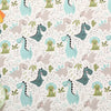 A fabric print featuring a grid pattern of various dinosaur silhouettes in shades of green, teal, and gray.