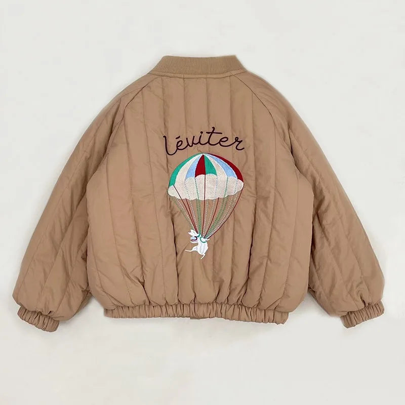 A beige padded jacket for kids featuring a graphic print of a parachute with the word leviter.