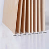 A close-up view of light wood craft sheets cut into vertical slats, showing varying thicknesses from 1.5mm to 10mm.