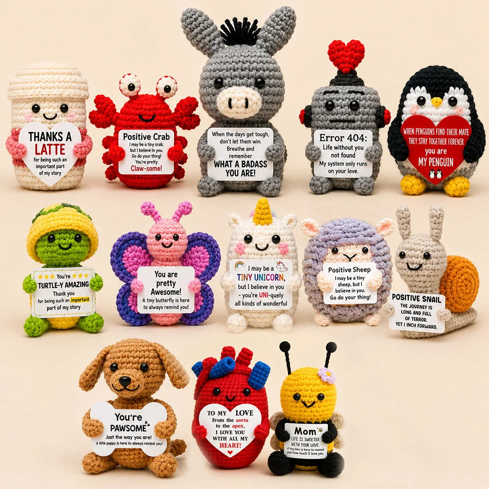 A collection of handmade crochet donkey dolls, each featuring a motivational card and various colors.