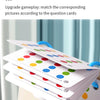 A stack of double-sided question cards with colored dots being used for a matching game.