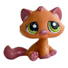 An orange and pink charming bobble head pet figurine of a cat.