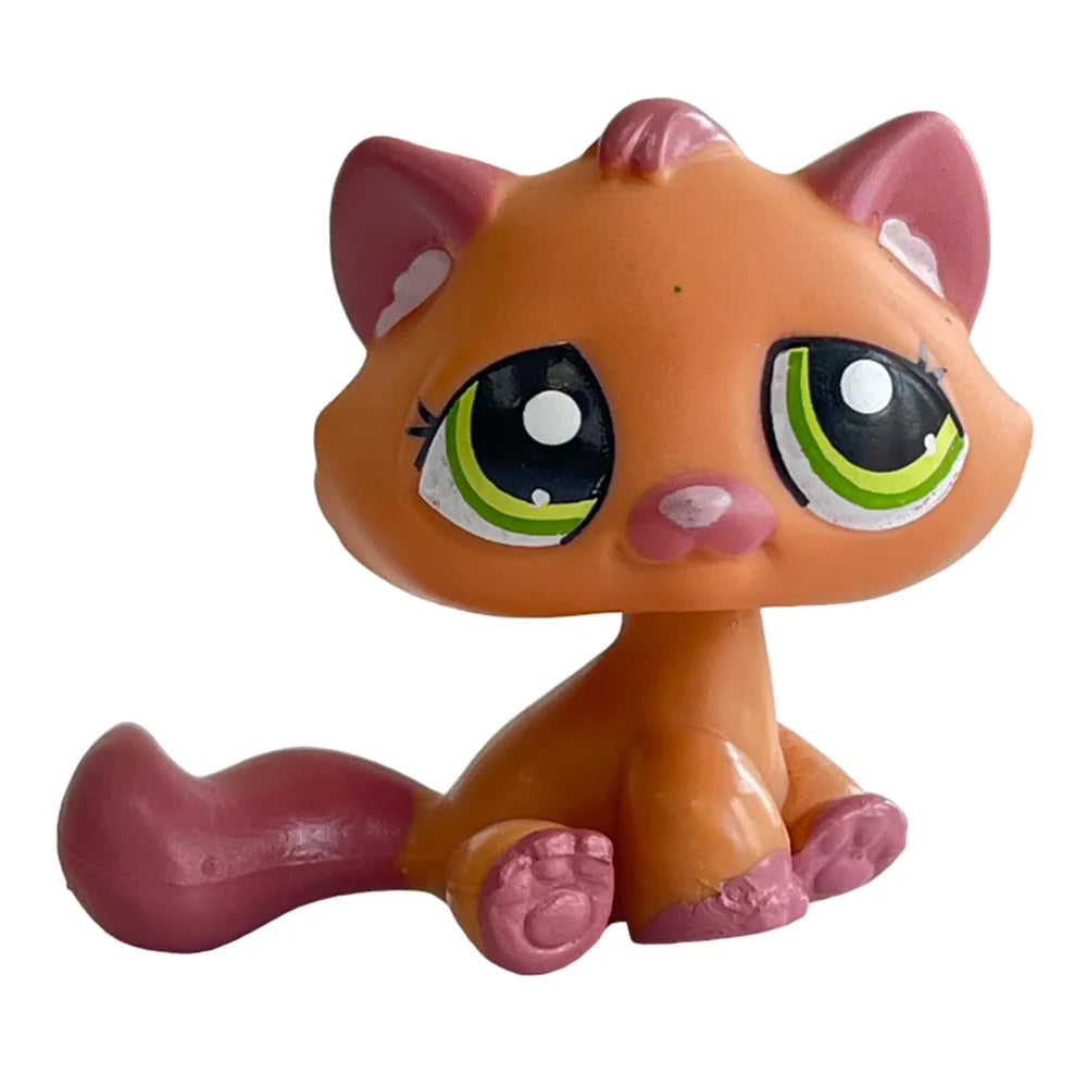 An orange and pink charming bobble head pet figurine of a cat.