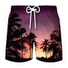 Men's beach swim shorts with a tropical coconut tree print against a sunset background