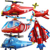 A collection of foil balloon planes in red, blue, and silver for birthday party decor.
