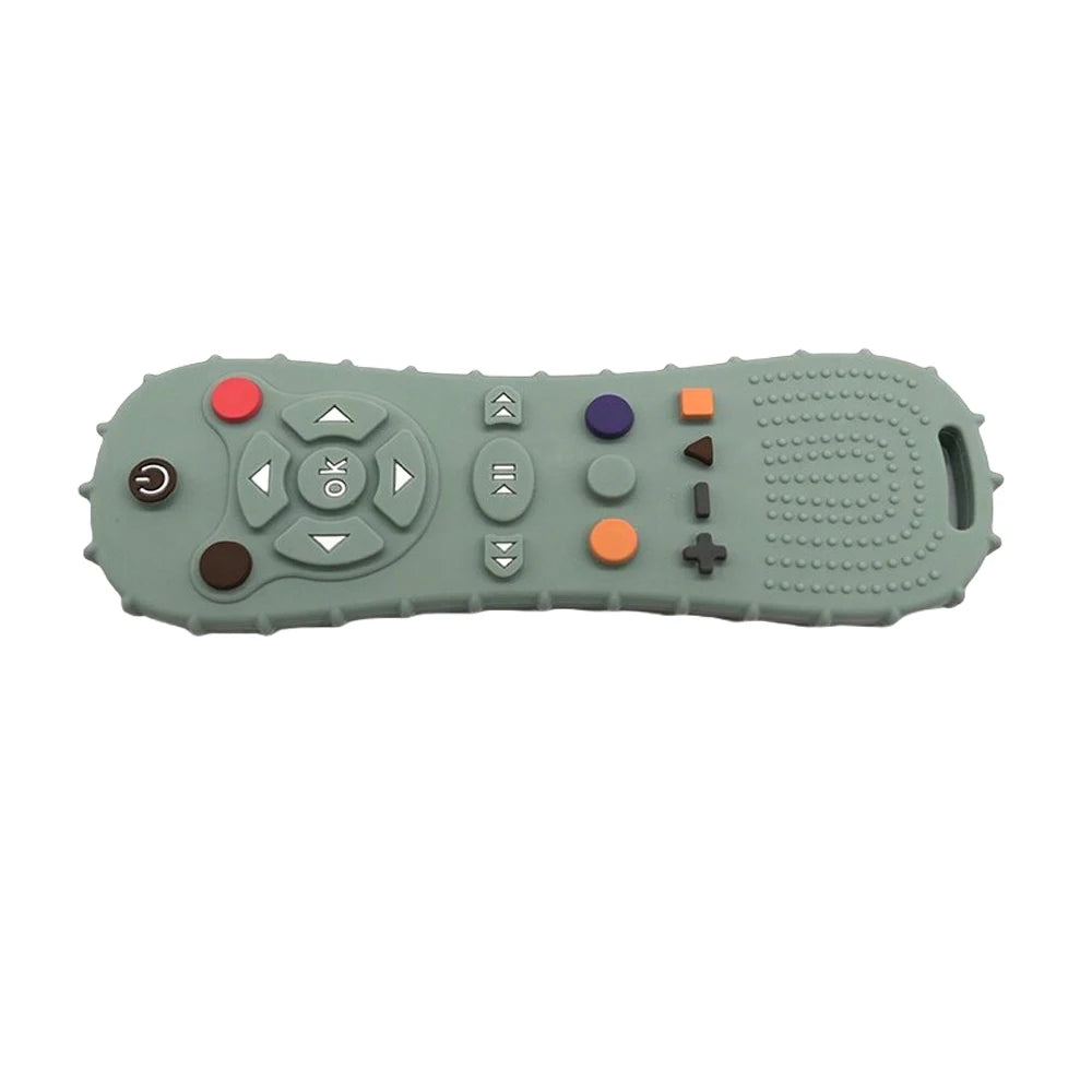 A silicone chew toy shaped like a remote control with various colored buttons and controls.