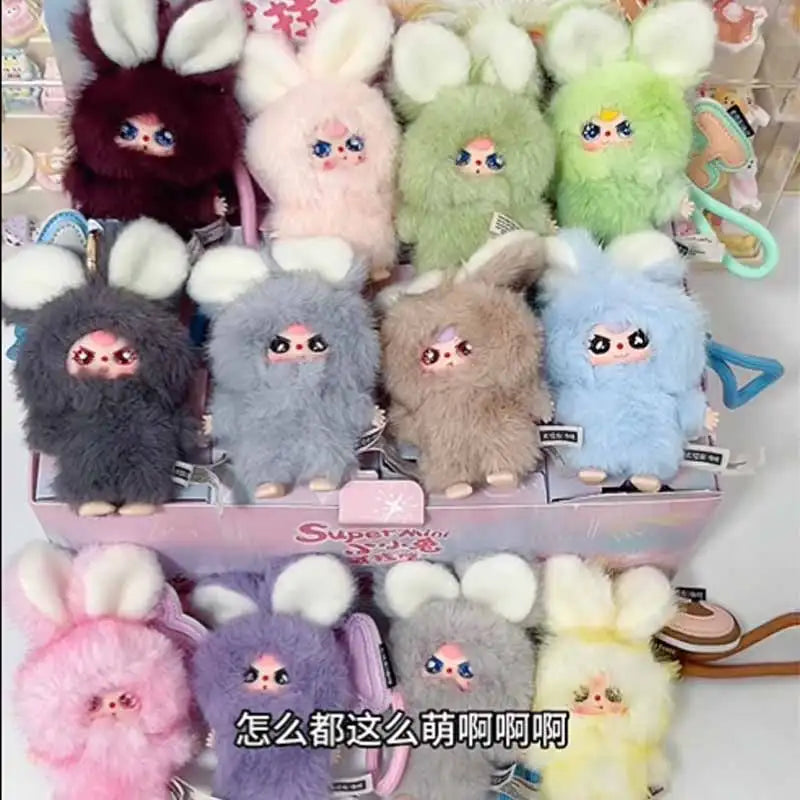A collection of fluffy bunny plush toys in various pastel colors and shades.