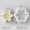 A white silicone mold for making snowflake-shaped items like candles or soap, shown with dimensions.