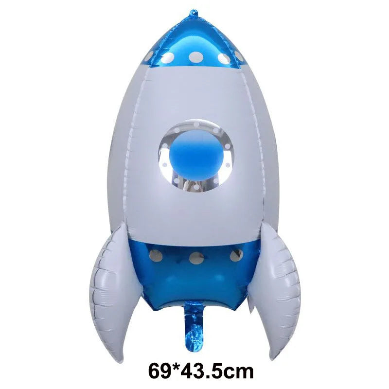 A white and blue foil balloon shaped like a rocket or plane for birthday party decor