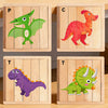Three wooden jigsaw puzzles featuring dinosaurs and forest animals: a green dinosaur, a red dinosaur, and a purple dinosaur.