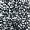 A close-up view of small, round glass crackle beads in various shades of black and clear.