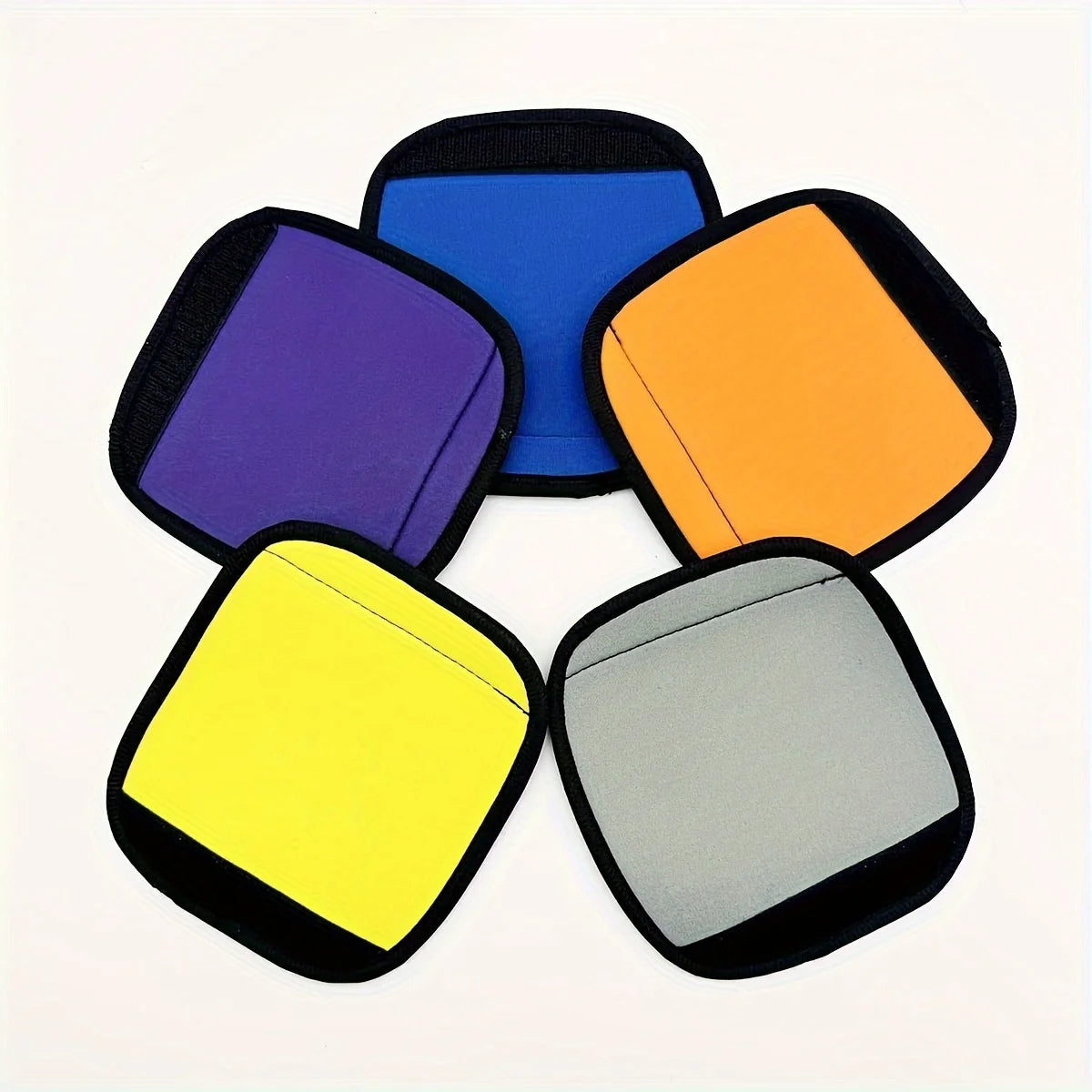 Five colored neoprene luggage handle covers in purple, blue, orange, yellow, and gray.