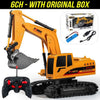 A yellow 1:24 scale remote control excavator with an original box and accessories.