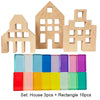 A set of wooden house blocks and rectangular blocks in various rainbow colors for creative play