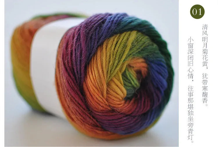A spool of hand-dyed rainbow merino wool yarn showing various shades of purple, green, orange, and yellow.
