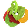 A set of green and orange silicone baby teethers shaped like a pineapple and a slice of citrus fruit.