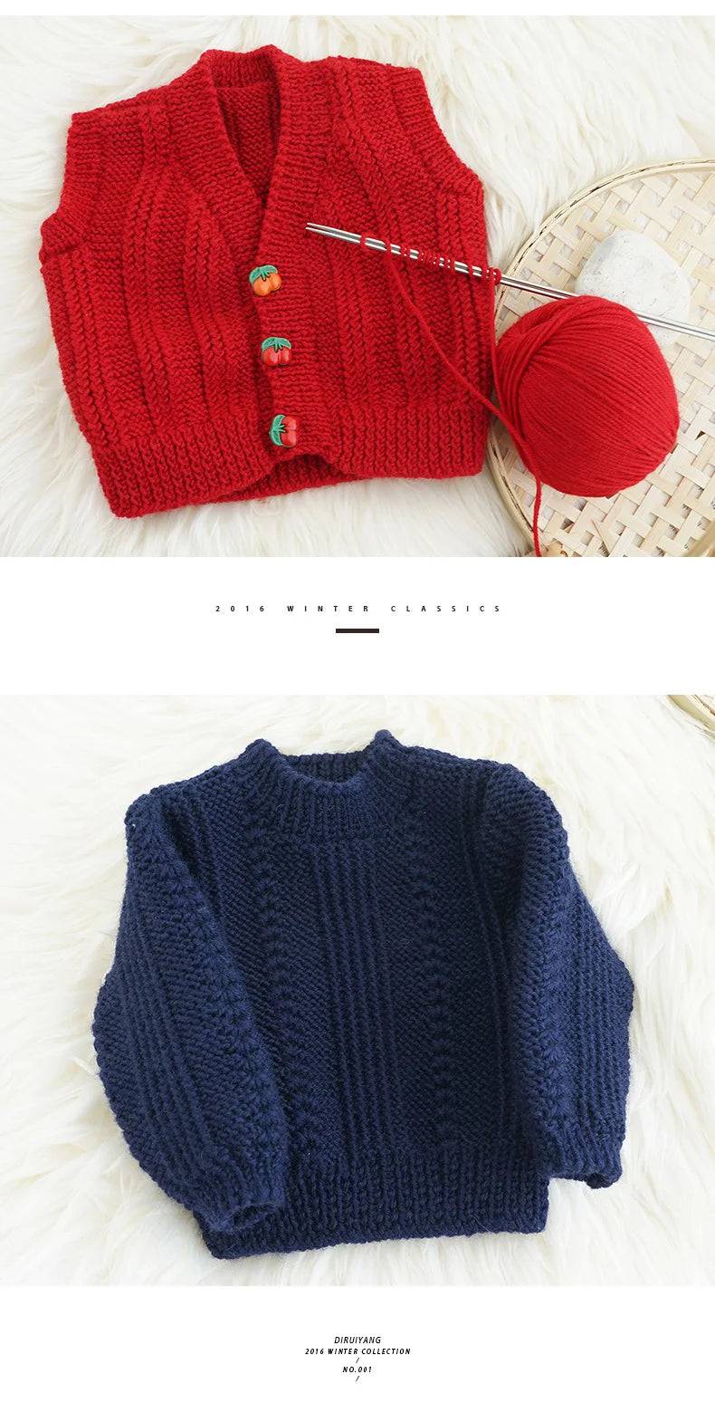 A close-up of a bright red knitted cardigan and a navy blue knitted sweater displayed on a white fluffy surface.