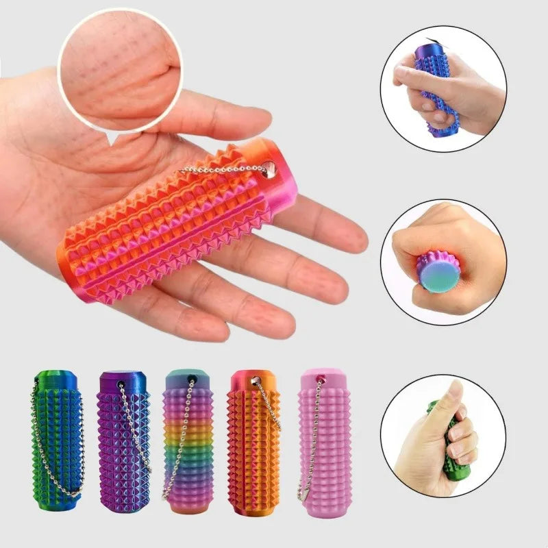 Various colors of spiky sensory keychains and a hand holding one for scale.