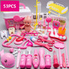A pink and white kids doctor pretend play medical kit featuring various tools like stethoscopes, syringes, and plastic instru