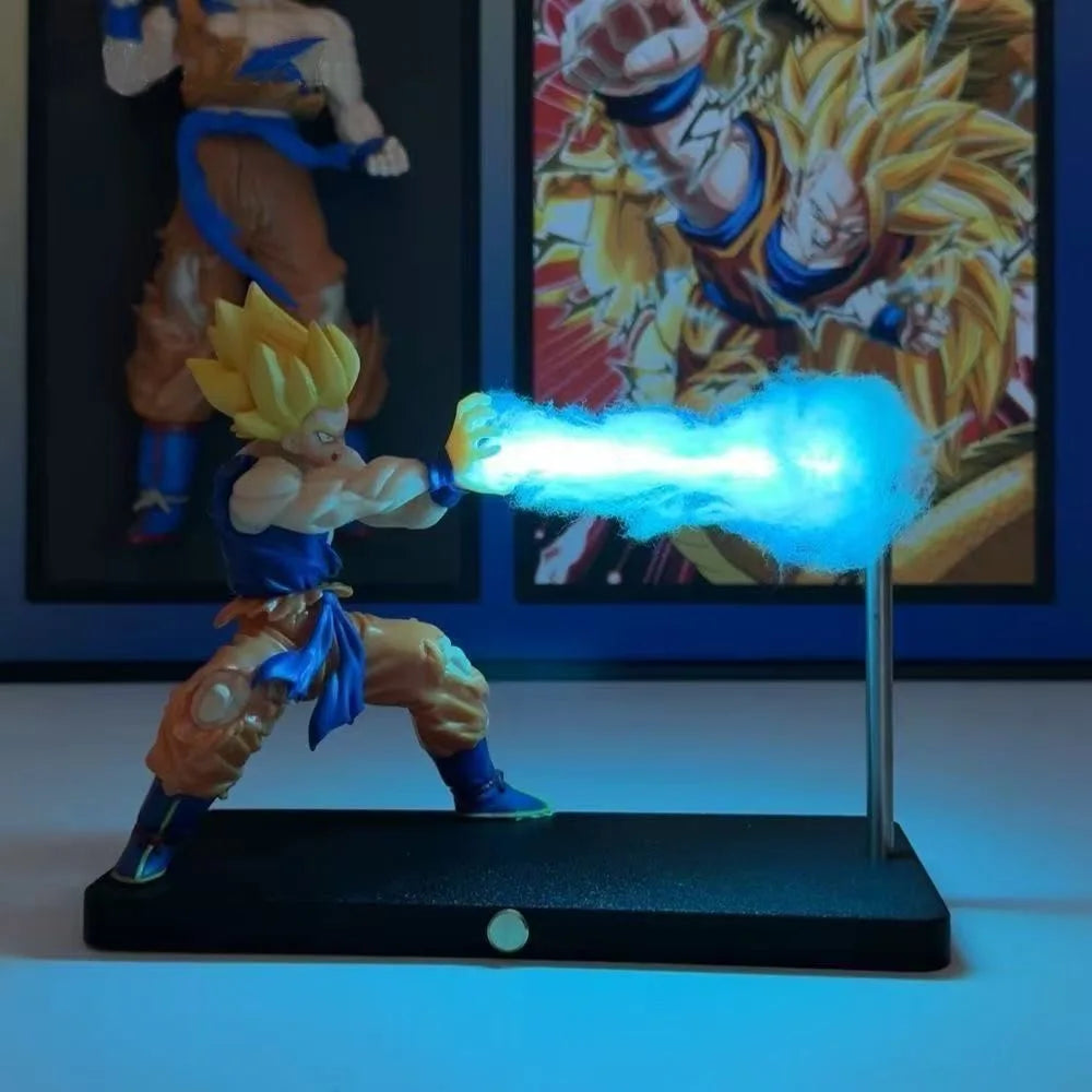 A figurine of Son Goku performing a Kamehameha attack, emitting a bright blue light.