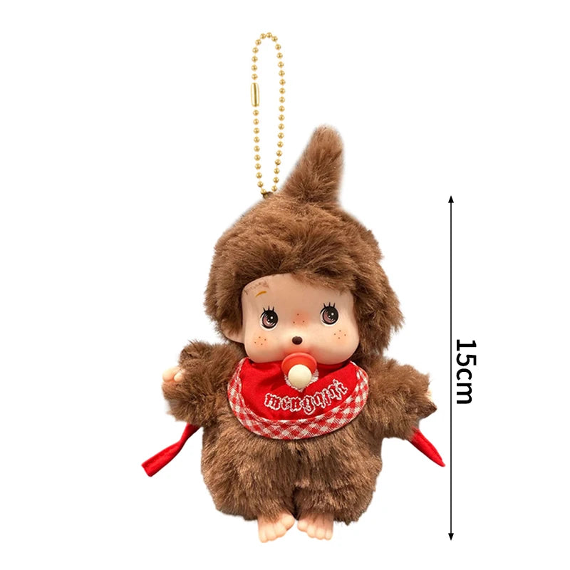 A brown fluffy plush cartoon character with a red checkered collar and a gold beaded keychain charm.