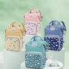 A collection of pink, yellow, and blue mommy backpacks with wet/dry separation features displayed on white pedestals.
