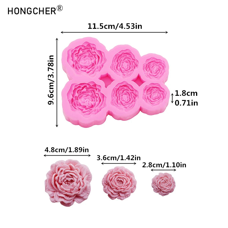 Pink silicone mold with multiple peony and rose shapes for resin jewelry and baking