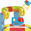 A colorful anti-gravity magnetic mini train toy with yellow, red, and blue components is shown.