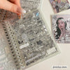 A close-up of a clear sticker book with intricate black line art and decorative elements for journaling and scrapbooking.