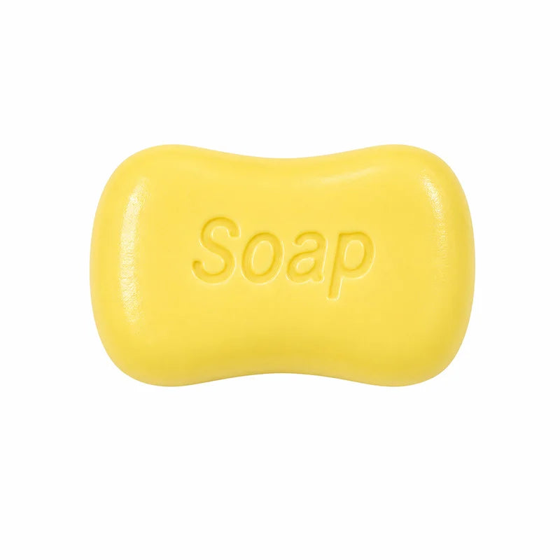A yellow, oval-shaped squishy toy molded to resemble a bar of soap.