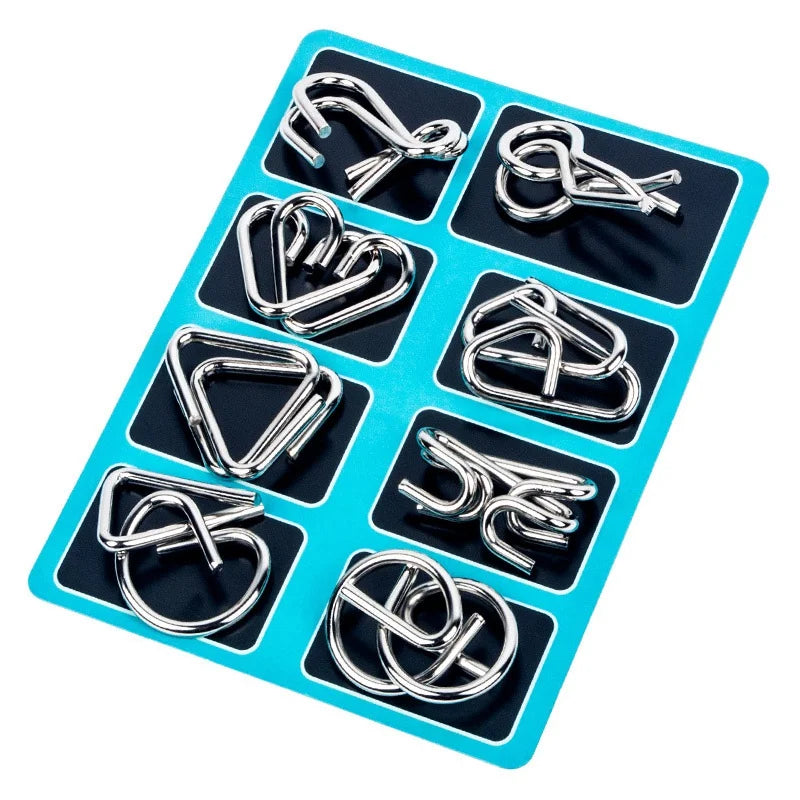 A blue plastic tray holding eight metal brain teaser puzzle pieces.