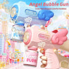 Pink angel bubble gun firing colorful bubbles in an outdoor party setting