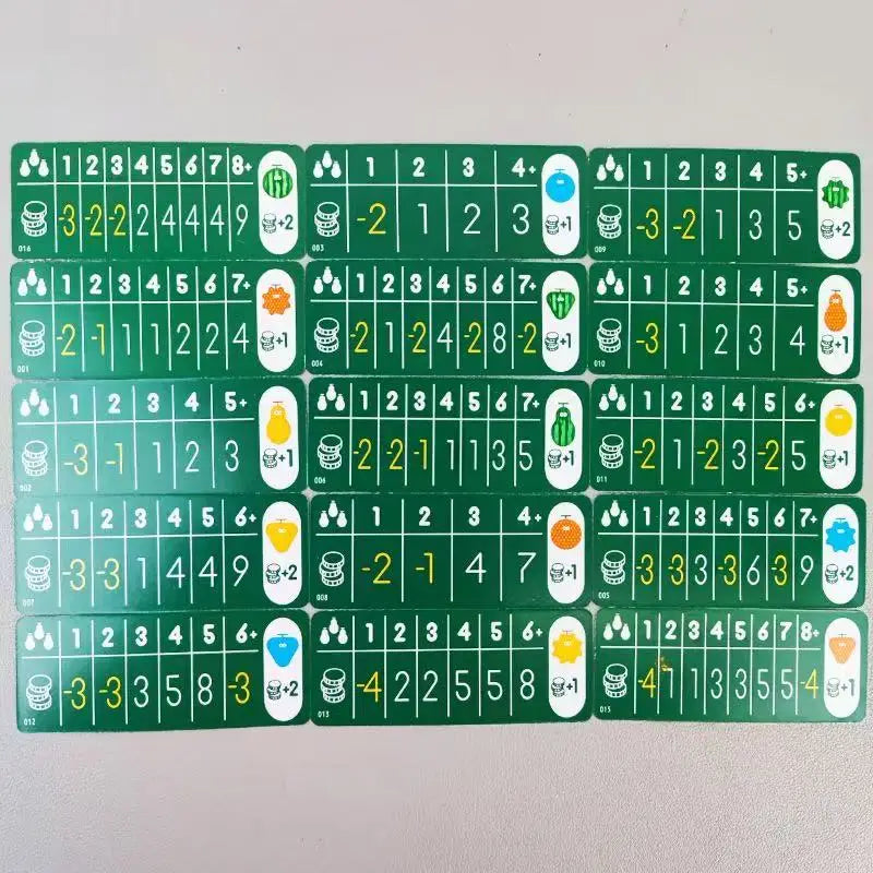 A collection of compact strategy board game cards featuring numbered tiles and symbols for family game night.