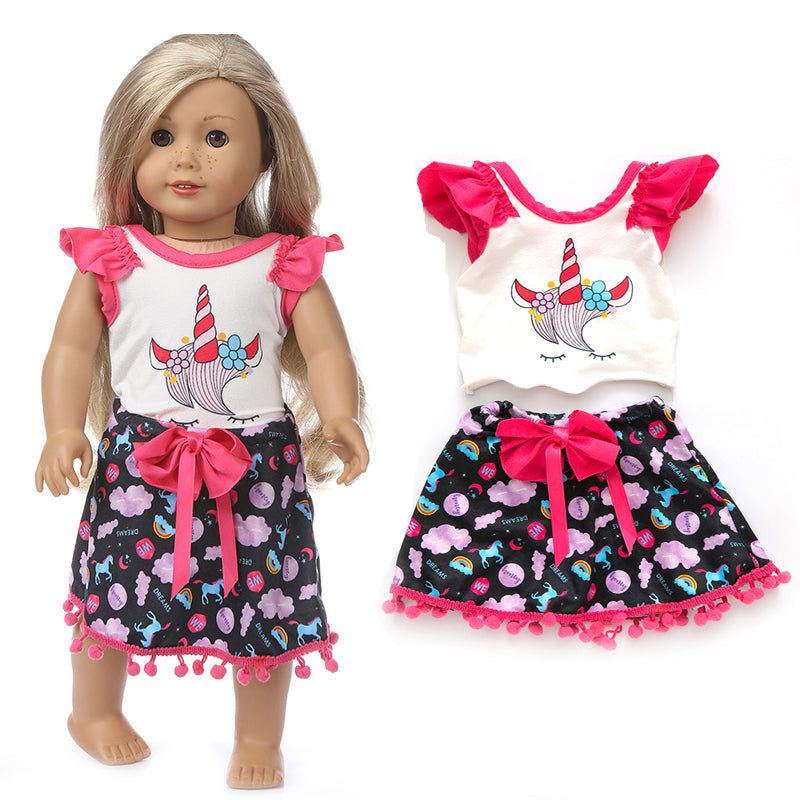 A doll outfit set featuring a white top, black skirt with pink trim, and matching tights.