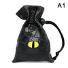 Black PU leather drawstring dice bag with an organizer compartment and a yellow eye design