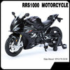 A black 1:12 scale die-cast model motorcycle with front steering visible in a studio setting.