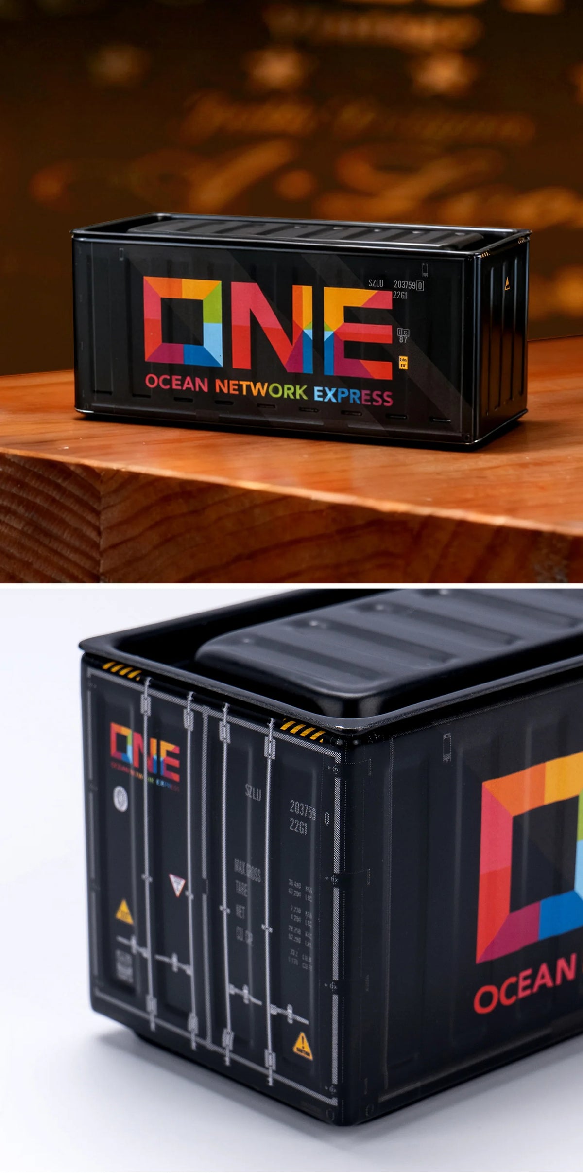 A black industrial iron storage box labeled ONE OCEAN NETWORK EXPRESS with an openable lid.