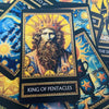 A tarot card depicting the King of Pentacles with a bearded face, gold crown, and rich robes against a dark background.