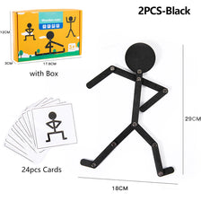 A set of two black wooden stick puzzles for children, including cards and a complete puzzle structure.