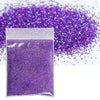 A small clear bag filled with vibrant purple holographic glitter powder scattered around it.