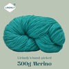 A ball of teal merino wool yarn labeled LIRISNLY