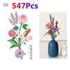 A set of 547 floral building blocks featuring pink, purple, and green flowers arranged in a bouquet.
