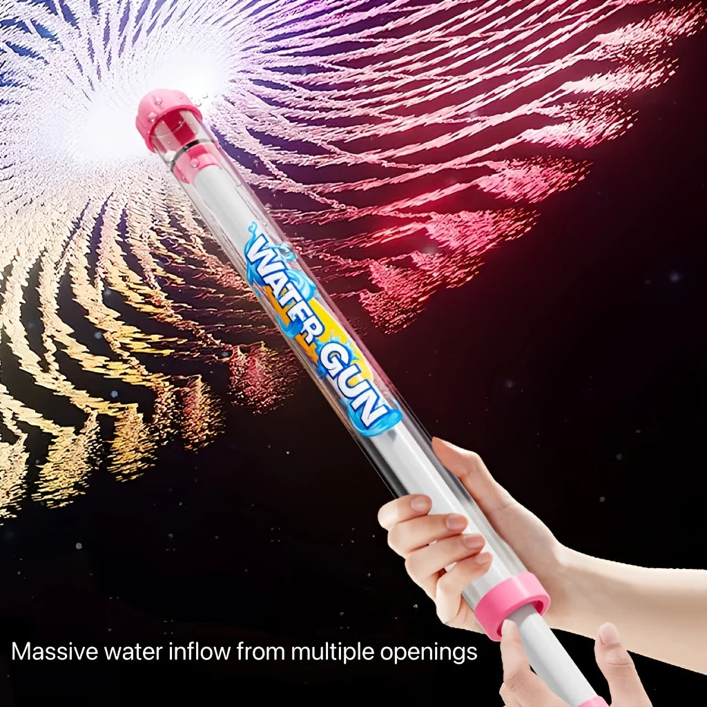 A hand holds a pink and white pull-back water gun, showing a powerful stream of water spray against a dark background.